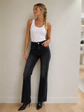 PANTALON VAQUERO TIRO ALTO NEGRO TACHUELAS MUJER
